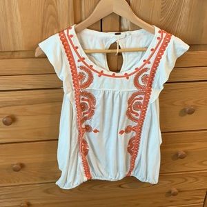 Cream and orange Free people shirt.